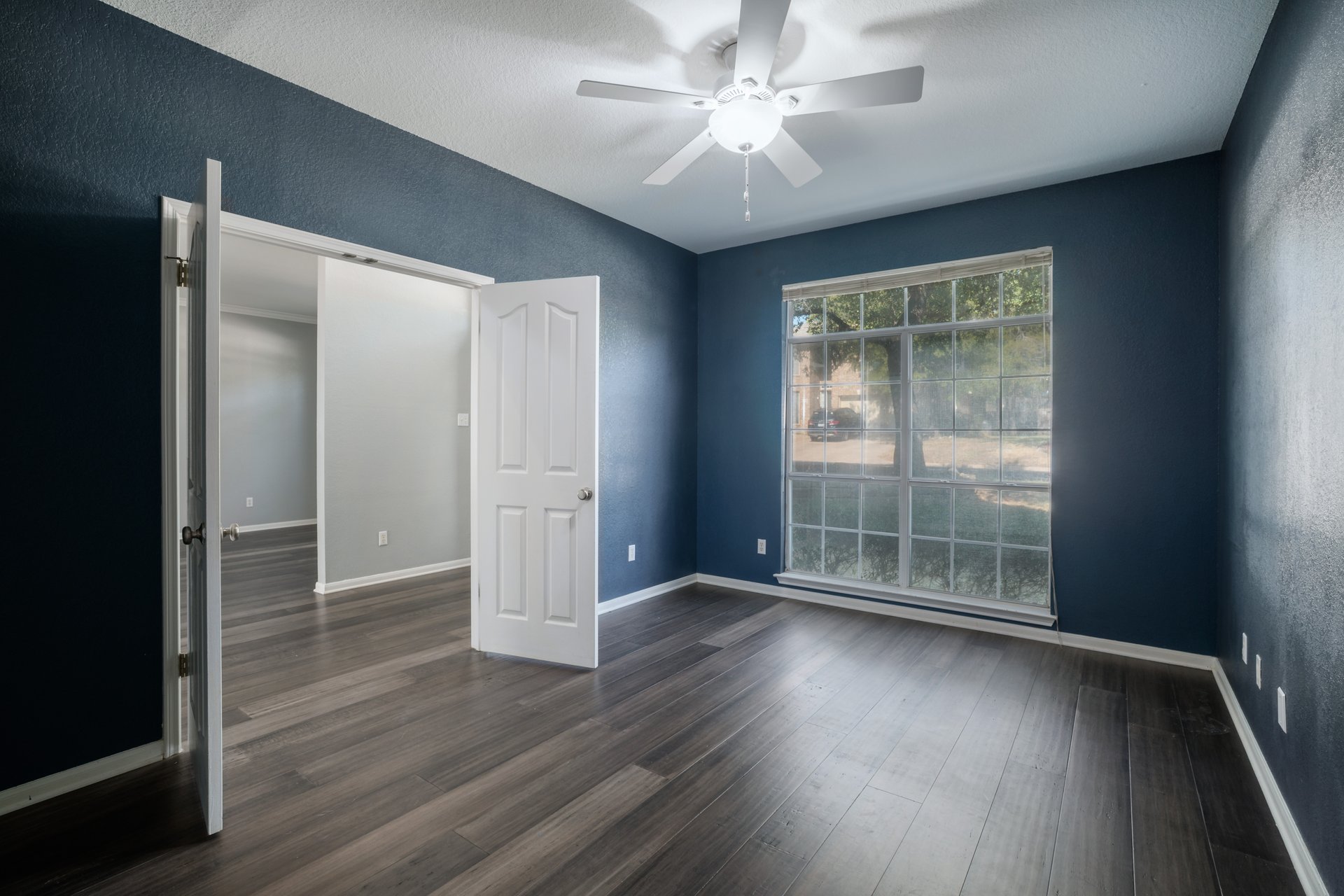 7113 Bending Oak Road Austin, TX 78749 - Photo 20 of 39 Gleaming hardwood floors and a large multi-pane window anchor this versatile, sunlit office