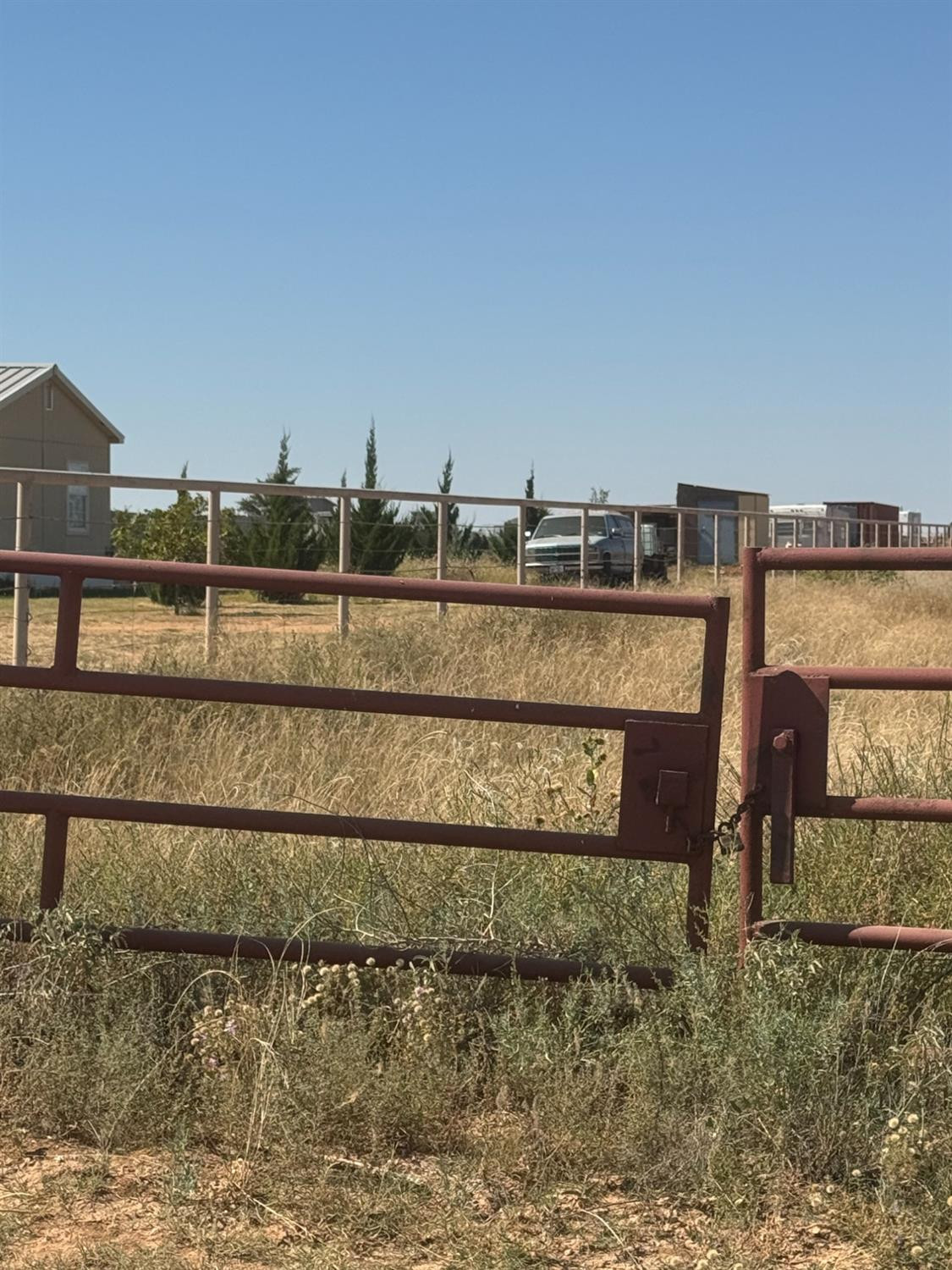 0 Fm 1264 Lubbock, TX 79415 - Photo 9 of 13 a view of a house with a yard and sitting area
