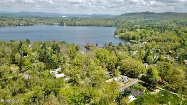 a view of a lake with a mountain and a lake view