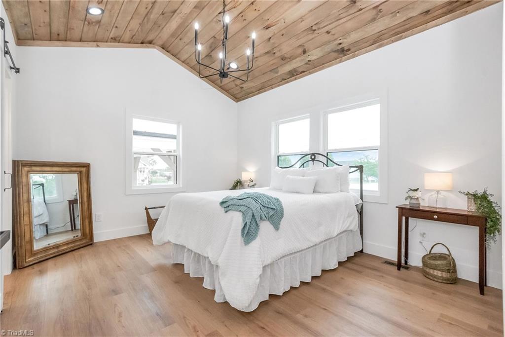 3598 Clingman Road Ronda, NC 28670 - Photo 19 of 35 Master Bedroom w/ tongue & groove valuted ceilings!