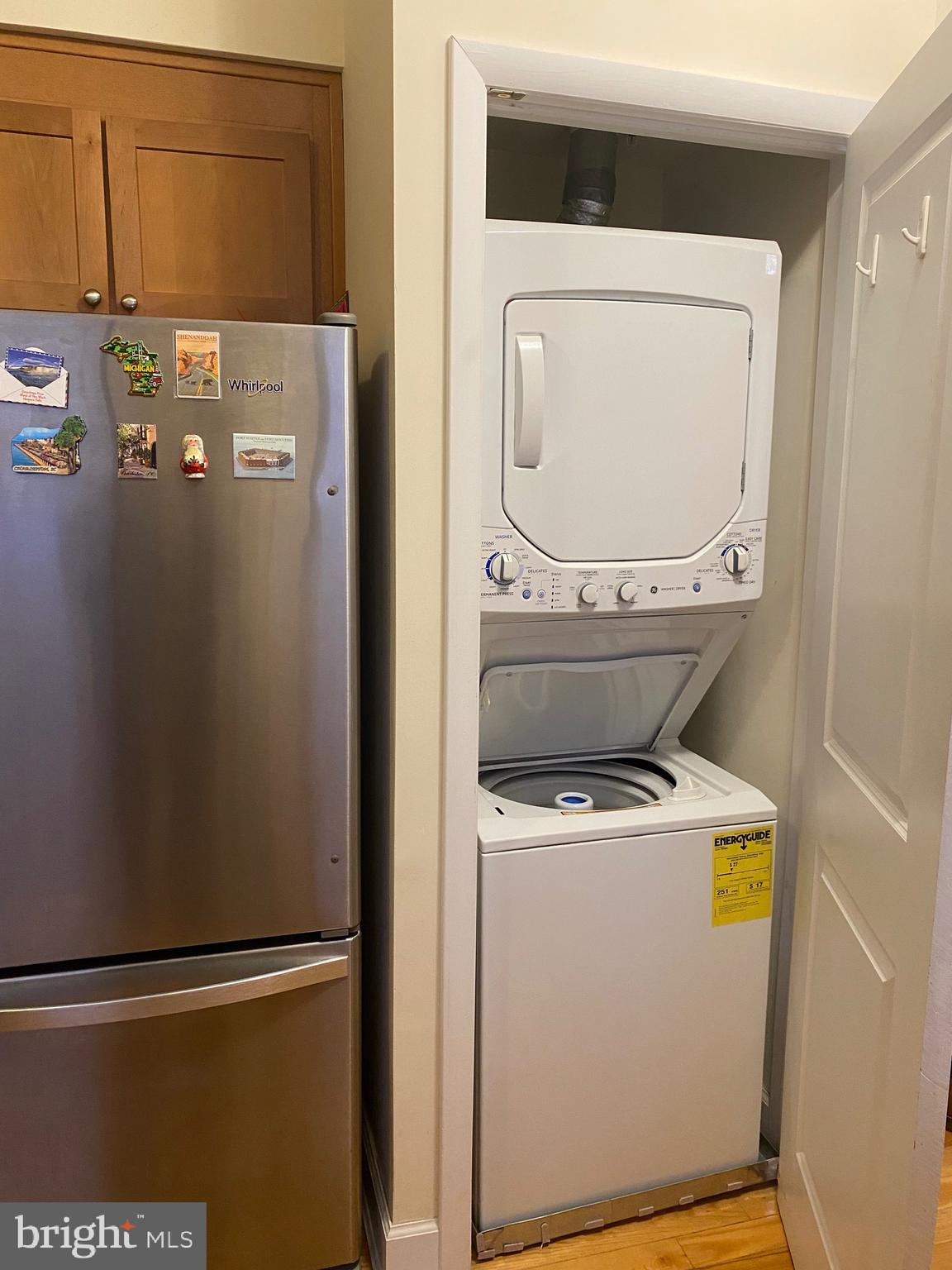 1858 California Street Northwest, Unit 33 Washington, DC 20009 - Photo 14 of 32 a utility room with dryer and washer