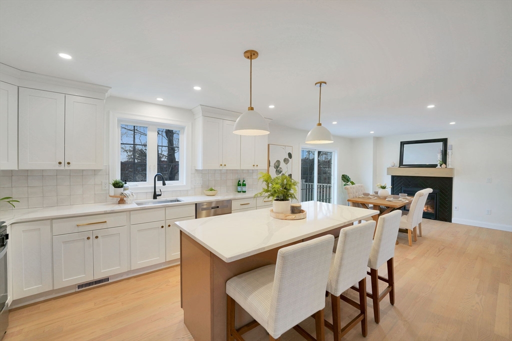 5 Rita's Way Fairhaven, MA 02719 - Photo 12 of 30 a large kitchen with a table and chairs