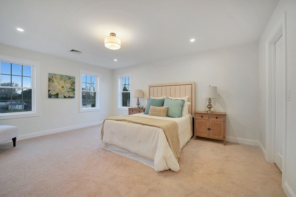 5 Rita's Way Fairhaven, MA 02719 - Photo 17 of 30 a bed room with a bed and a night stand