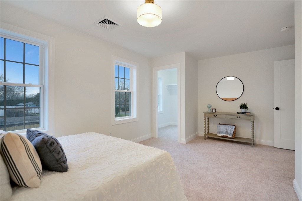 5 Rita's Way Fairhaven, MA 02719 - Photo 21 of 30 a bedroom with a bed and a window