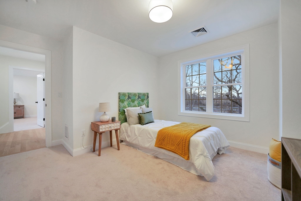 5 Rita's Way Fairhaven, MA 02719 - Photo 25 of 30 a bedroom with a bed and a window