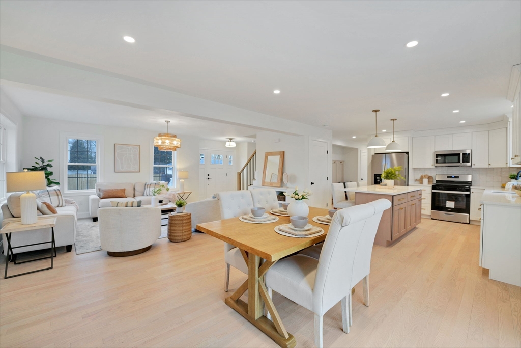 5 Rita's Way Fairhaven, MA 02719 - Photo 8 of 30 a living room with furniture and kitchen view