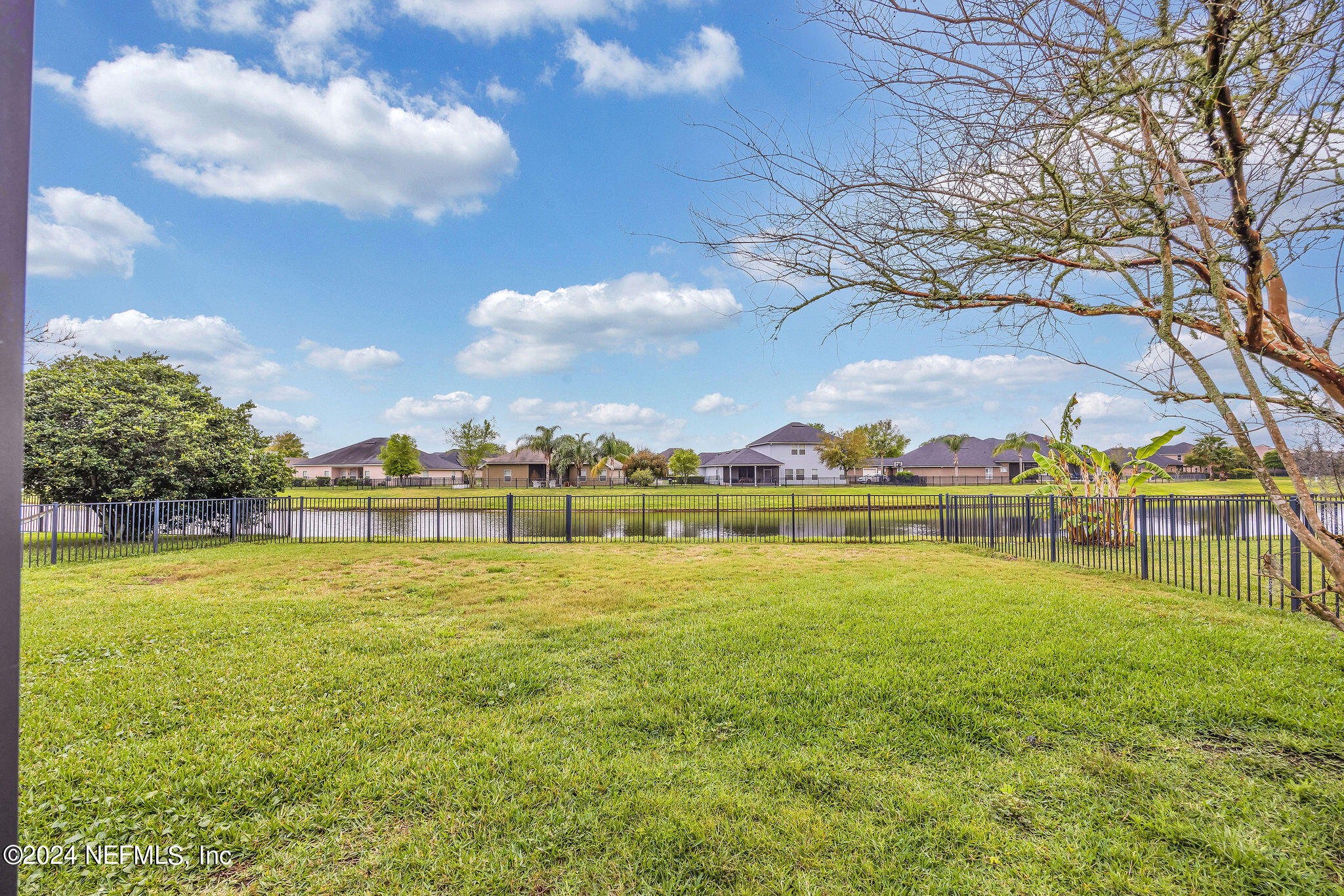 737 Porta Rosa Circle St. Augustine, FL 32092 - Photo 16 of 75 a view of an ocean with a house in the background