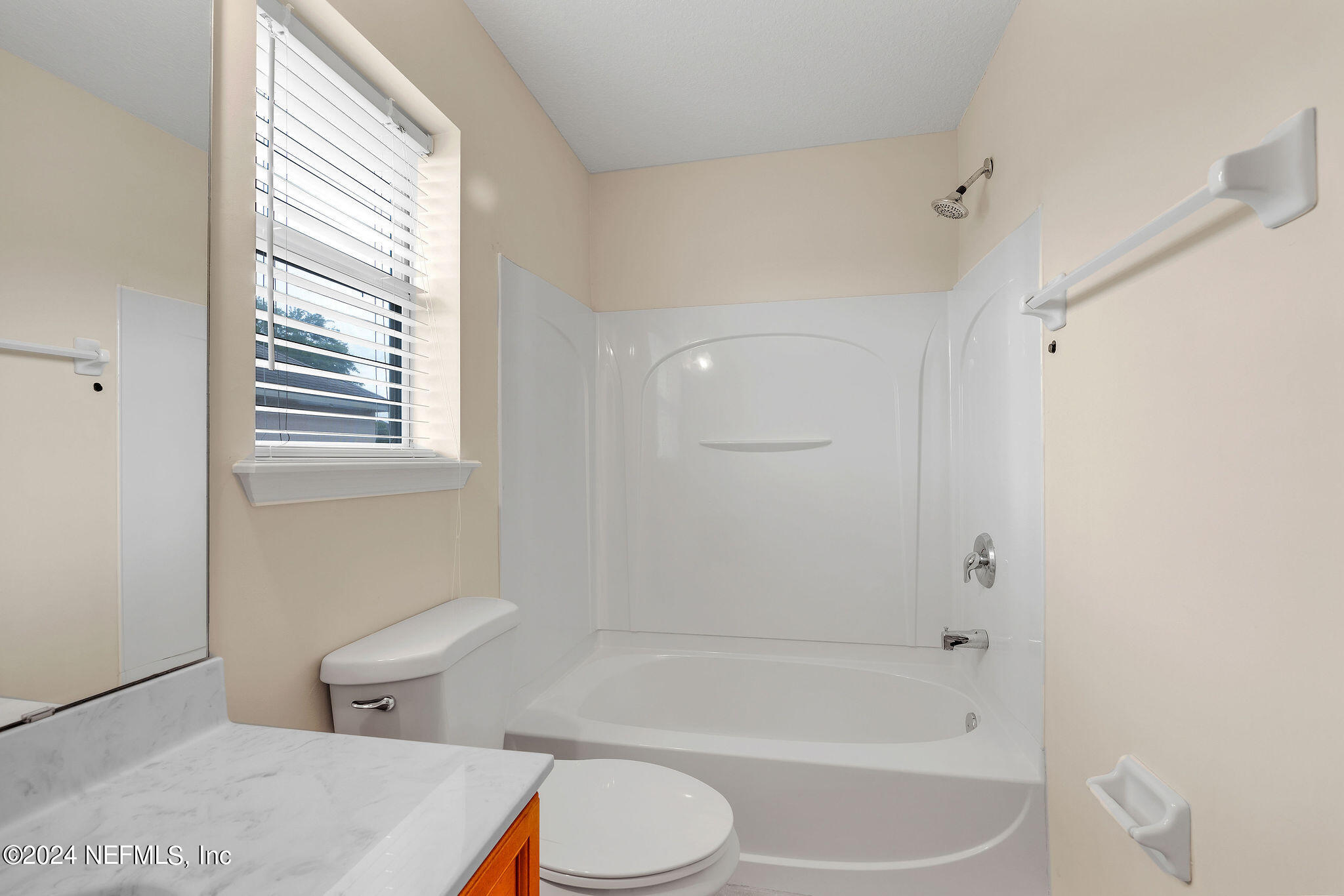 737 Porta Rosa Circle St. Augustine, FL 32092 - Photo 40 of 75 a bathroom with a toilet and a bathtub