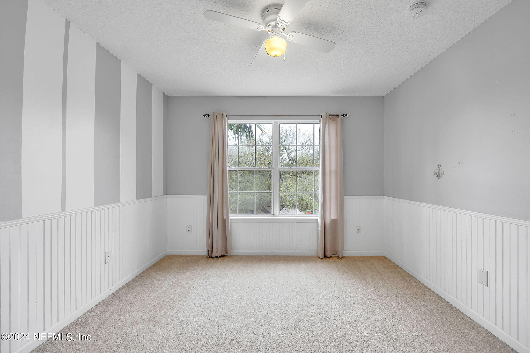 737 Porta Rosa Circle St. Augustine, FL 32092 - Photo 43 of 75 wooden floor in an empty room with a window