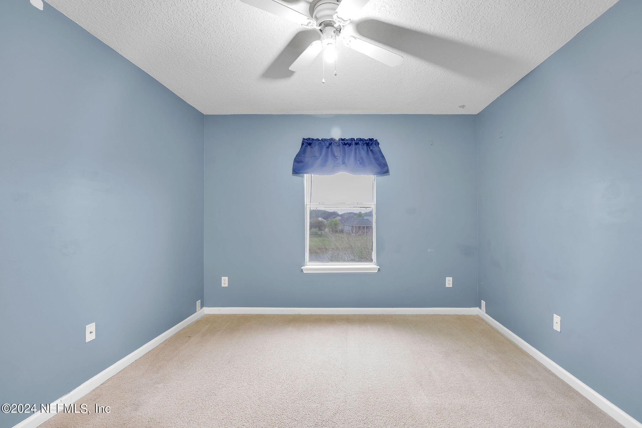 737 Porta Rosa Circle St. Augustine, FL 32092 - Photo 46 of 75 an empty room with a window and a fan