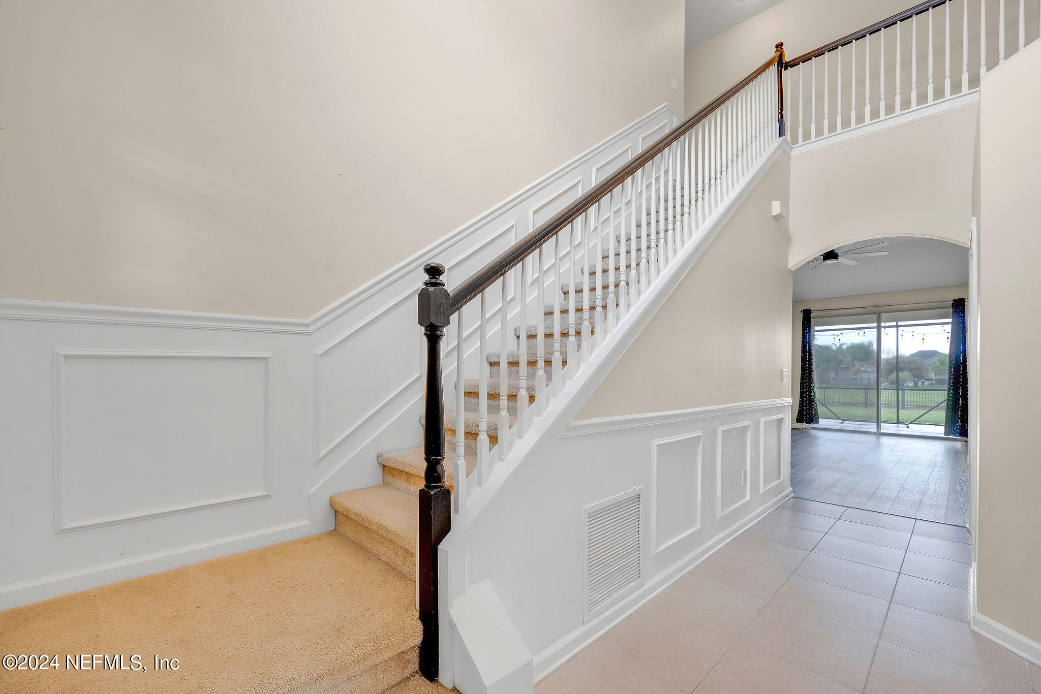 737 Porta Rosa Circle St. Augustine, FL 32092 - Photo 49 of 75 a view of staircase with white walls and a rug