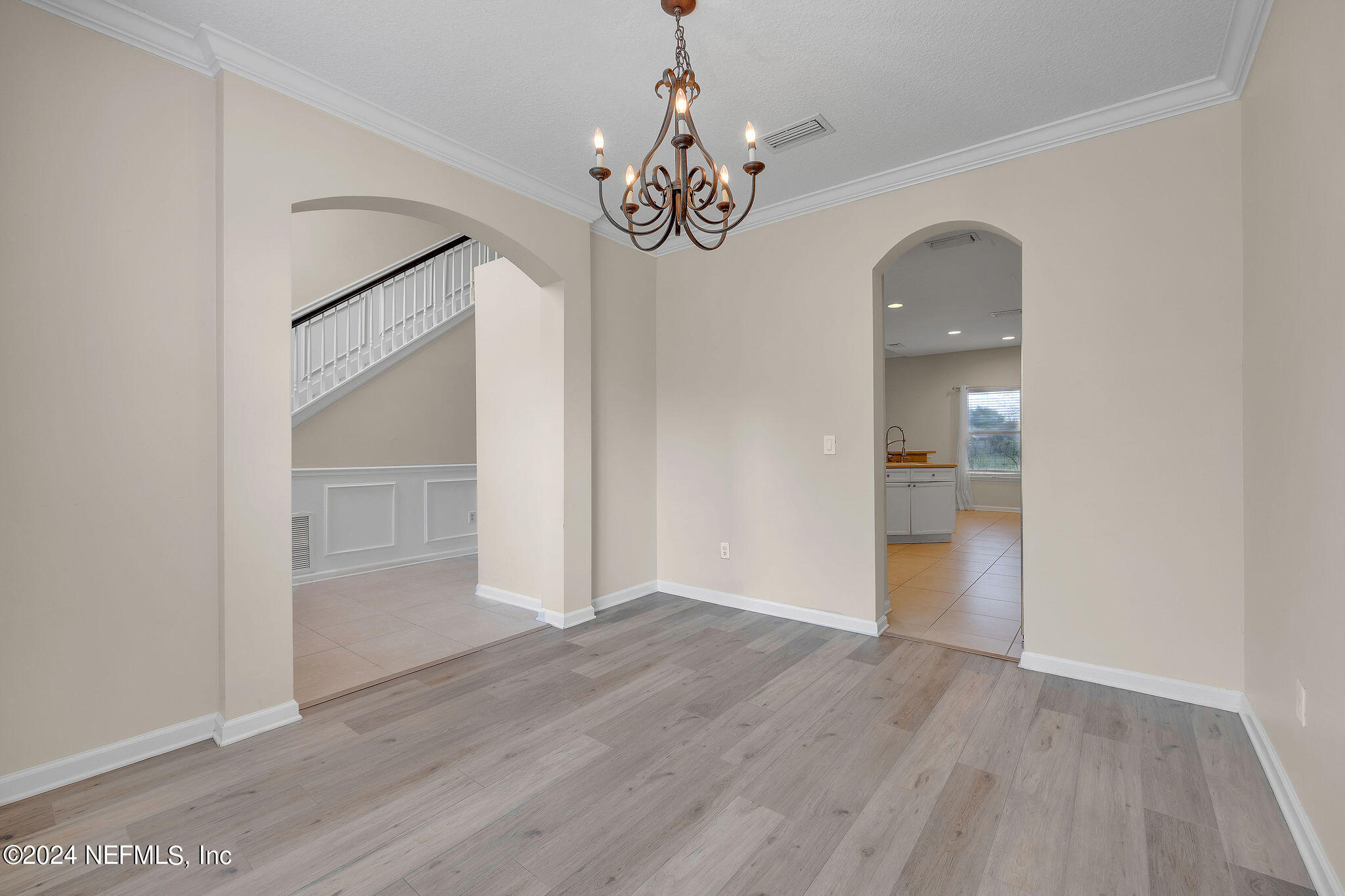 737 Porta Rosa Circle St. Augustine, FL 32092 - Photo 52 of 75 wooden floor in an empty room with a window