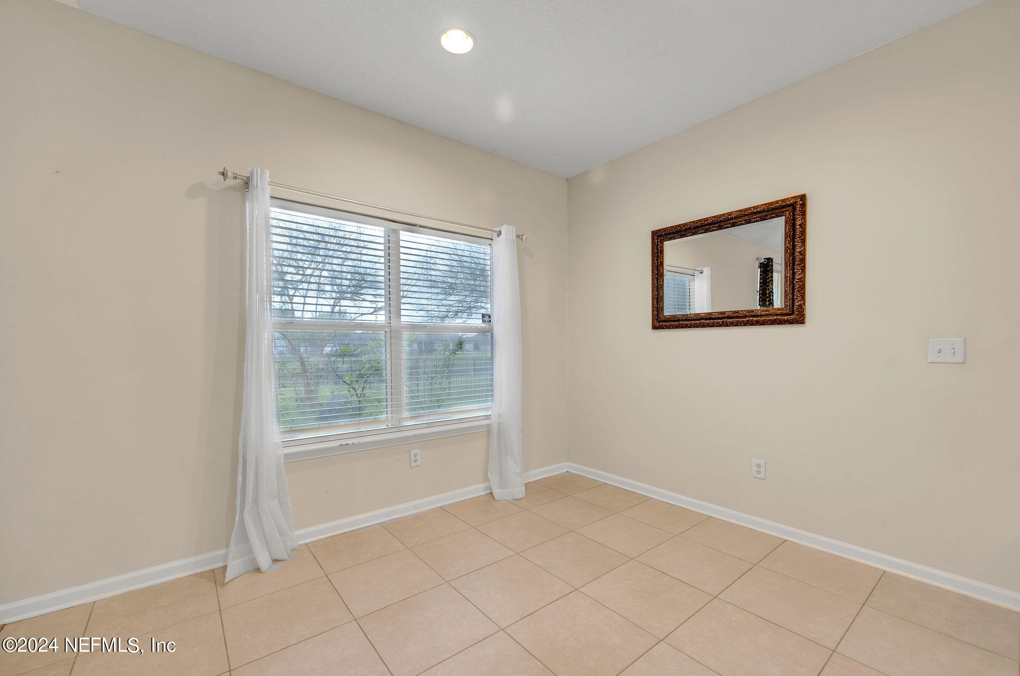 737 Porta Rosa Circle St. Augustine, FL 32092 - Photo 55 of 75 a view of an empty room with a window