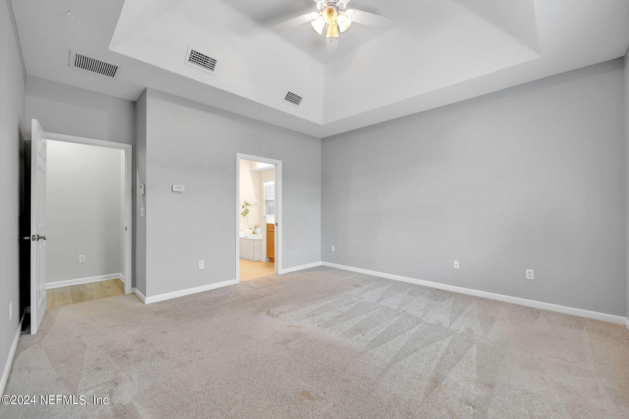 737 Porta Rosa Circle St. Augustine, FL 32092 - Photo 62 of 75 a view of an empty room with a chandelier fan