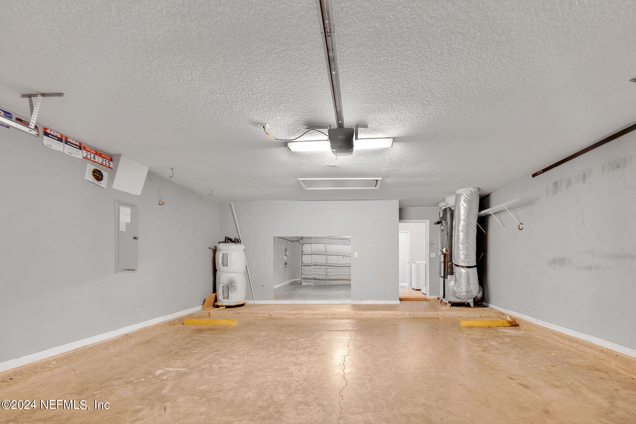 737 Porta Rosa Circle St. Augustine, FL 32092 - Photo 69 of 75 a view of a livingroom with a fireplace and a ceiling fan