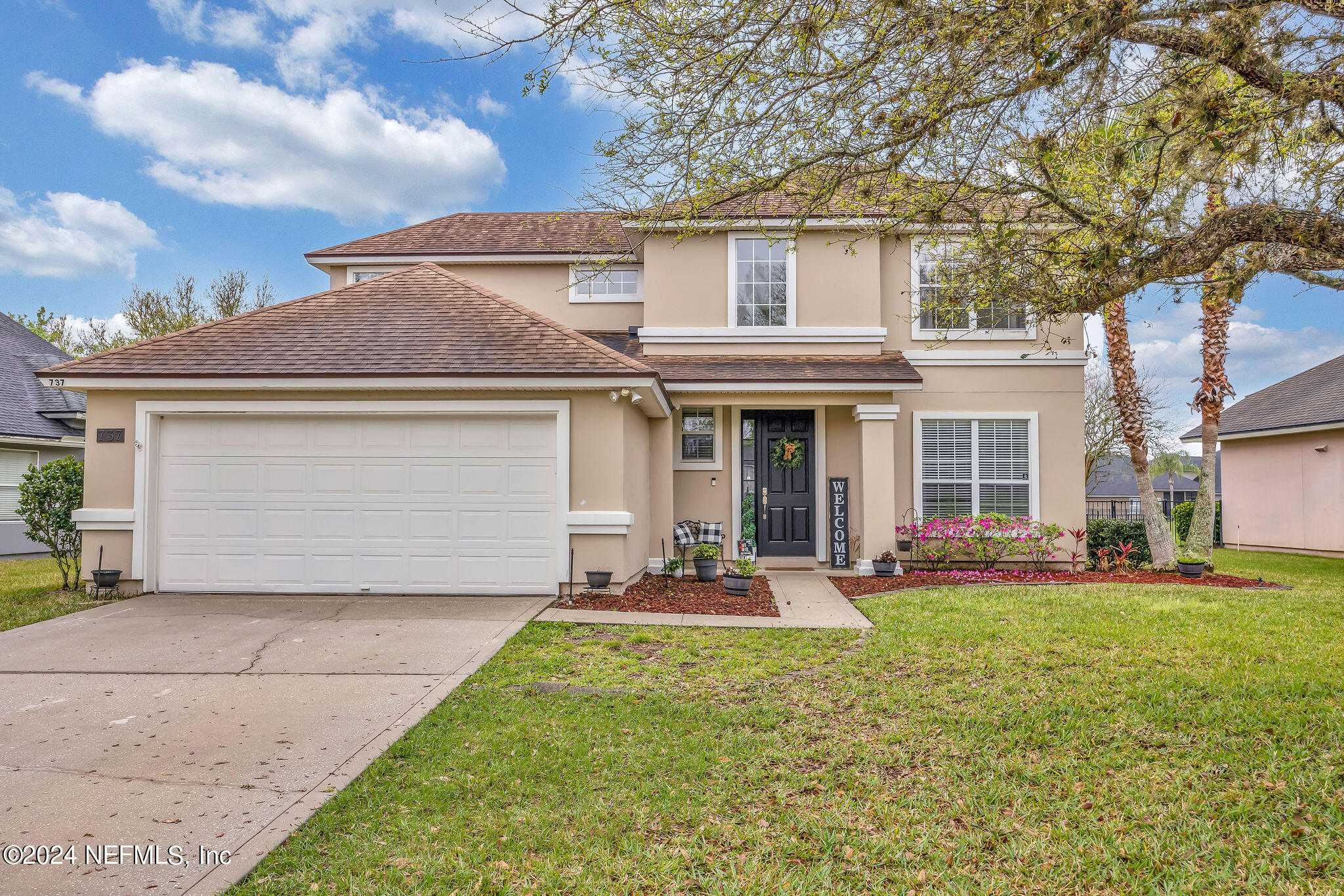 737 Porta Rosa Circle St. Augustine, FL 32092 - Photo 10 of 75 front view of a house with a yard