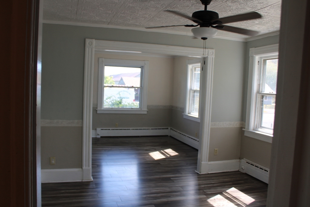 7 State Road Whately, MA 01373 - Photo 15 of 31 a view of empty room with wooden floor and fan