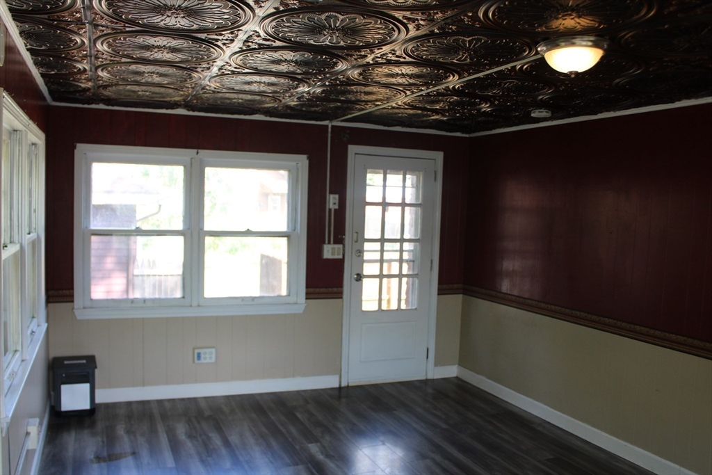 7 State Road Whately, MA 01373 - Photo 19 of 31 a view of an empty room with wooden floor and a window