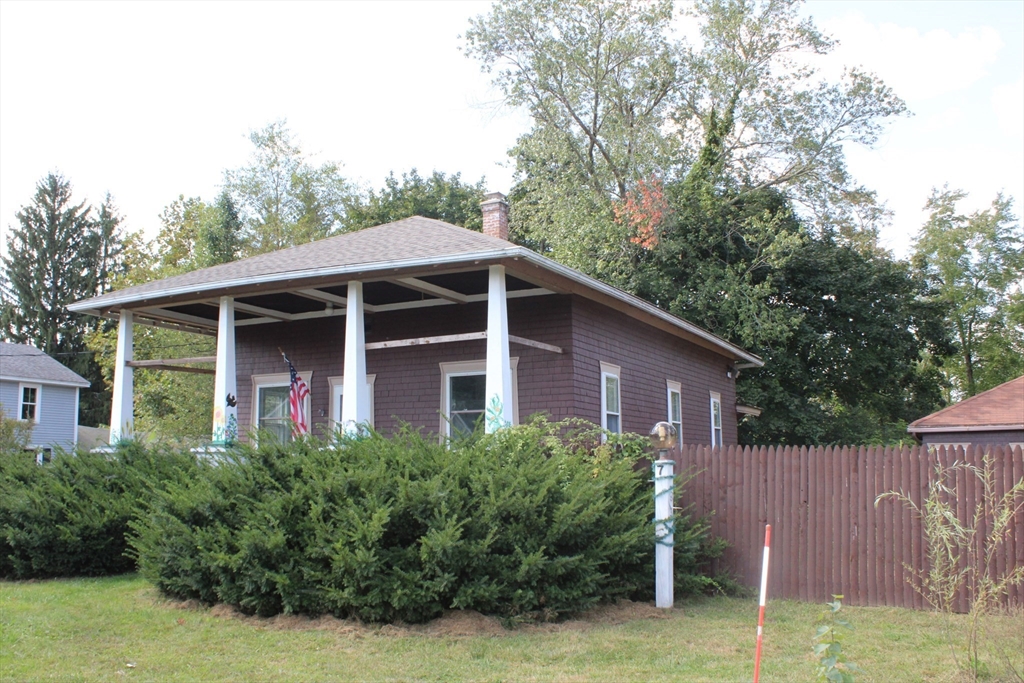 7 State Road Whately, MA 01373 - Photo 2 of 31 a front view of a house with garden