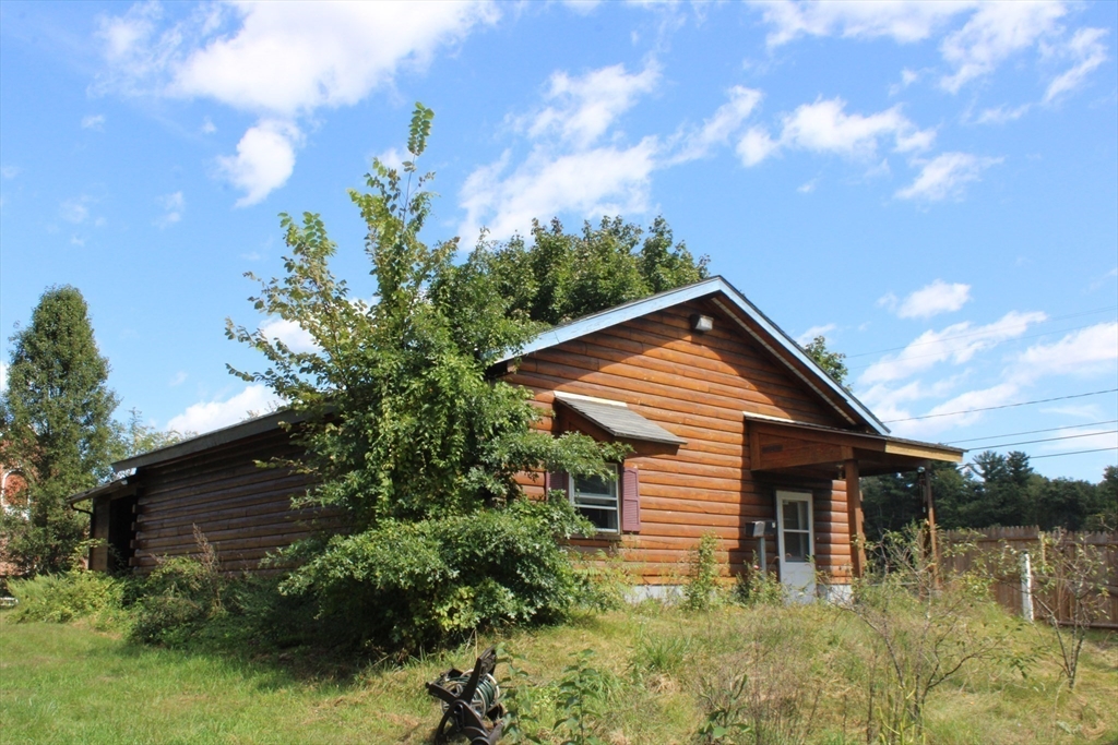 7 State Road Whately, MA 01373 - Photo 24 of 31 a backyard of a house with plants and tree
