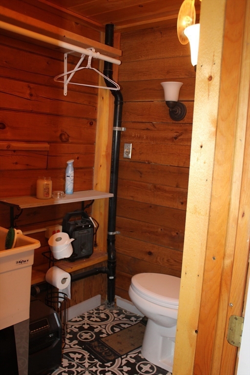 7 State Road Whately, MA 01373 - Photo 30 of 31 a bathroom with a toilet and a mirror