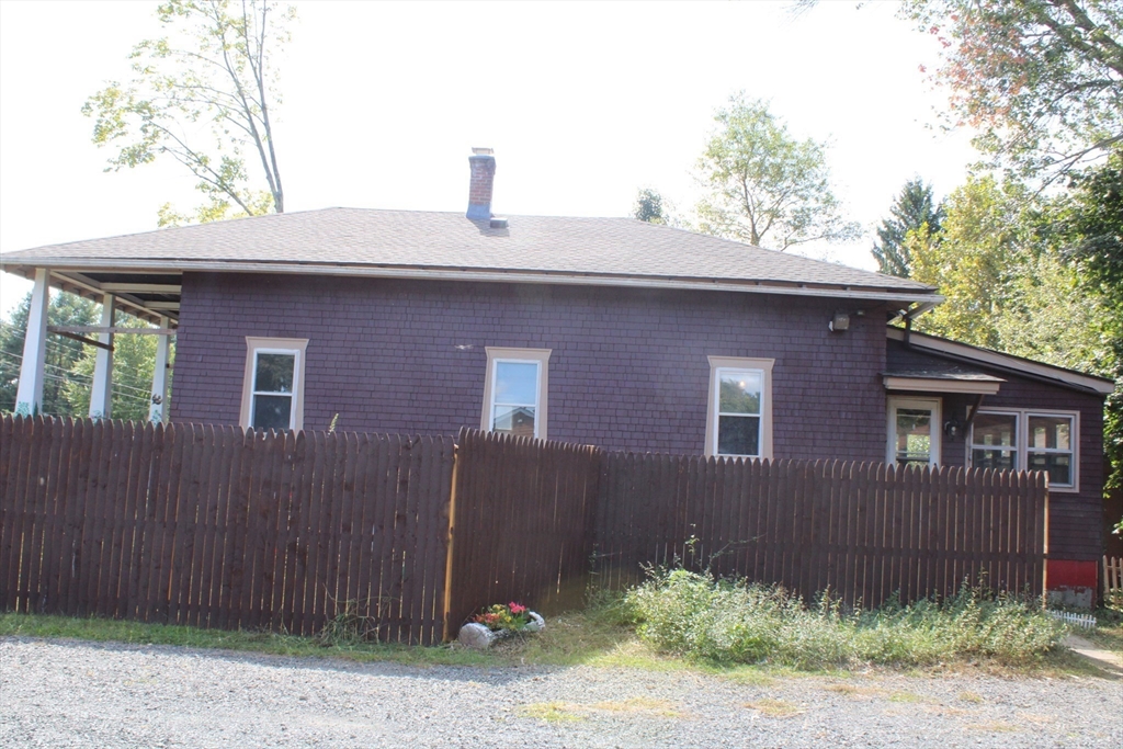 7 State Road Whately, MA 01373 - Photo 5 of 31 a front view of a house with garden