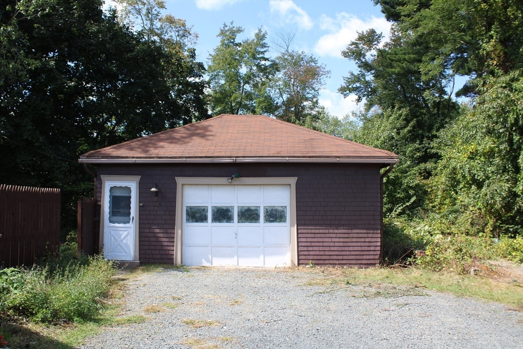7 State Road Whately, MA 01373 - Photo 6 of 31 a view of a house with a garage