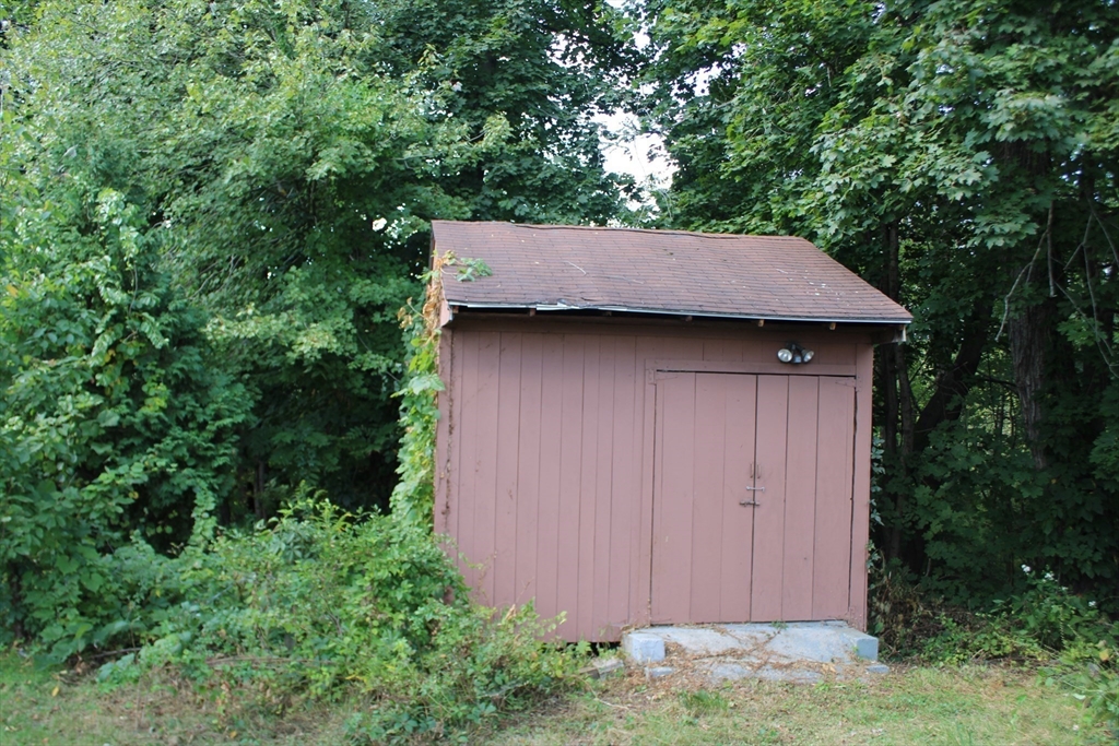 7 State Road Whately, MA 01373 - Photo 7 of 31 a view of barn in the middle of a backyard