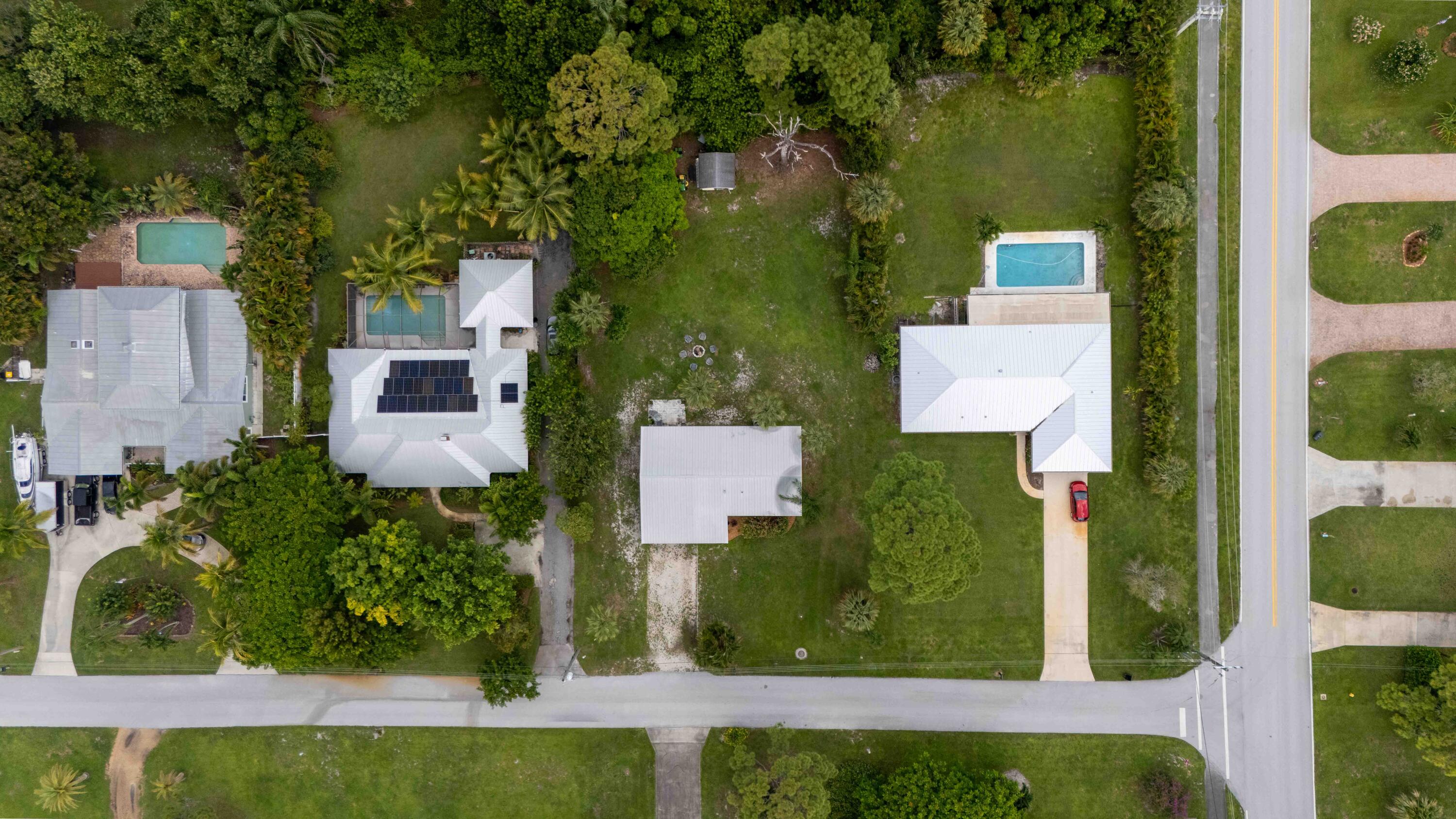 1849 Northwest Pine Tree Way Stuart, FL 34994 - Photo 23 of 29 an aerial view of a house