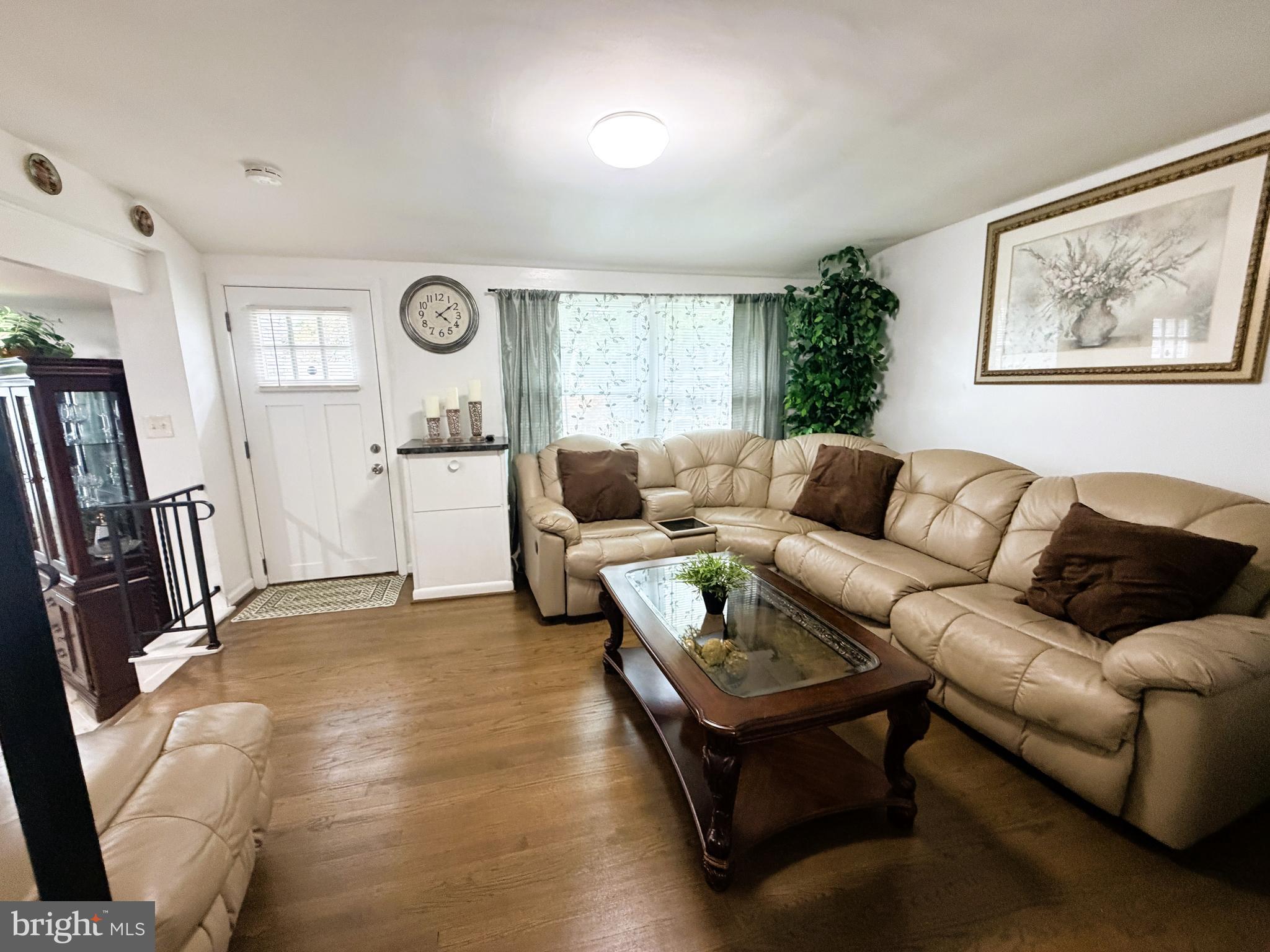 7403 S Road Rosedale, MD 21237 - Photo 15 of 27 a living room with furniture and a large window