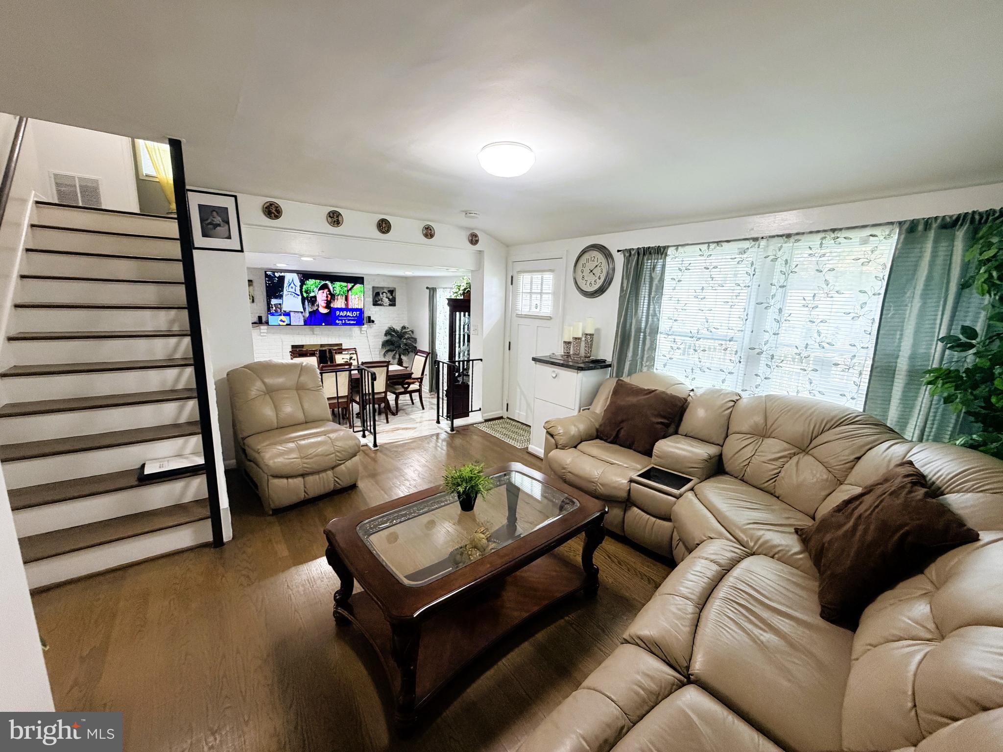 7403 S Road Rosedale, MD 21237 - Photo 16 of 27 a living room with furniture and a large window