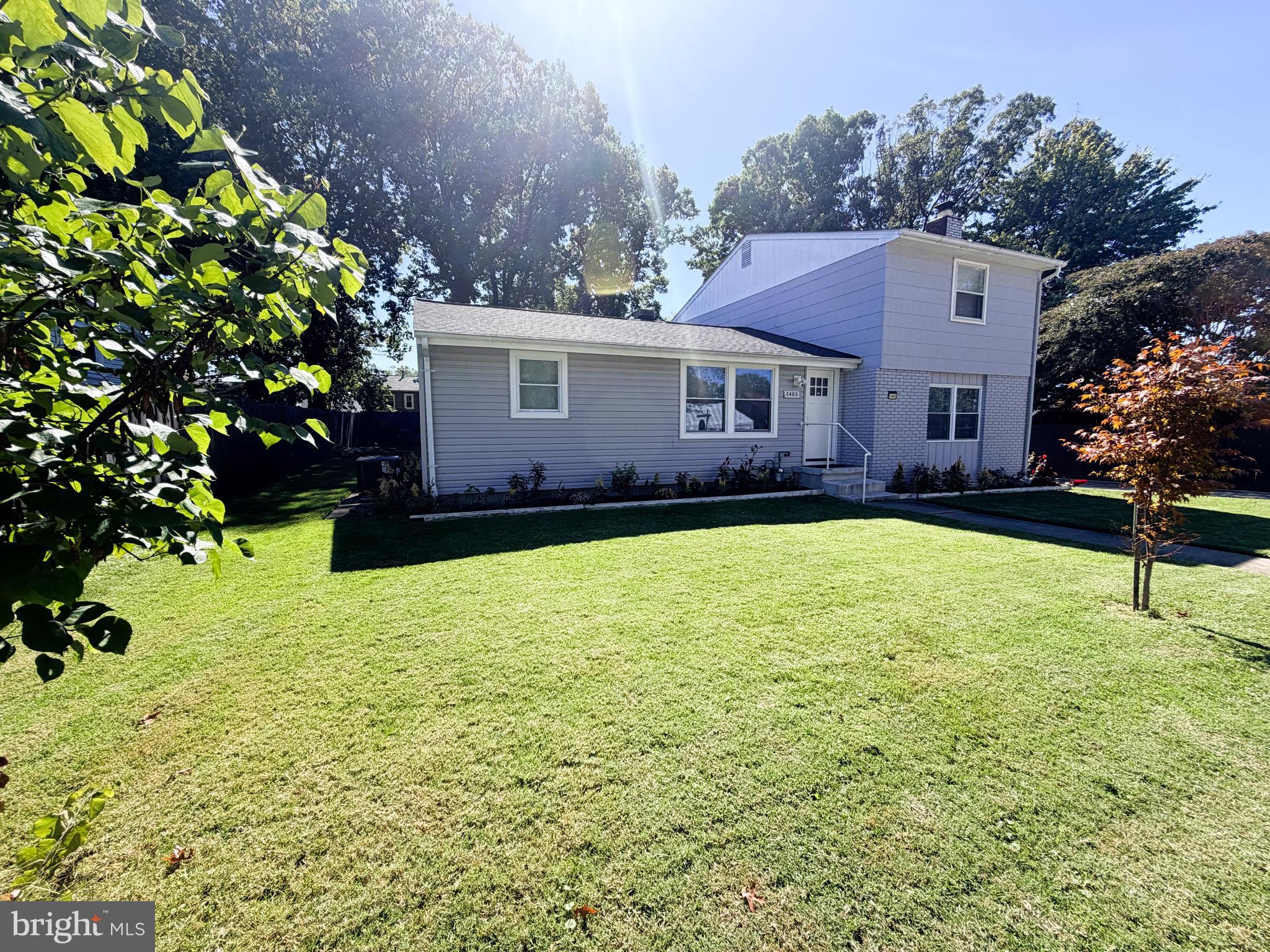 7403 S Road Rosedale, MD 21237 - Photo 2 of 27 a house view with a garden space