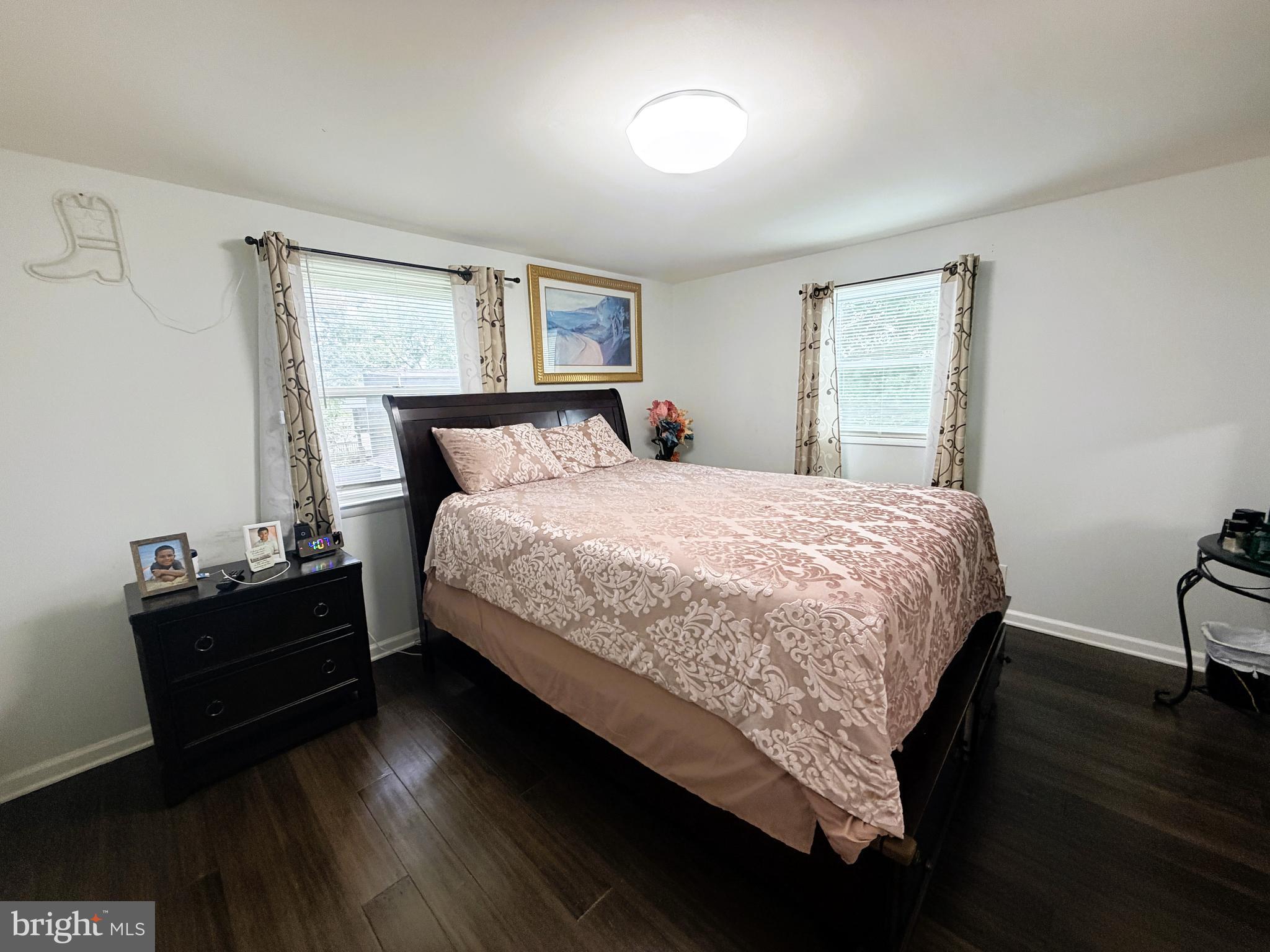 7403 S Road Rosedale, MD 21237 - Photo 21 of 27 a bedroom with a bed and window