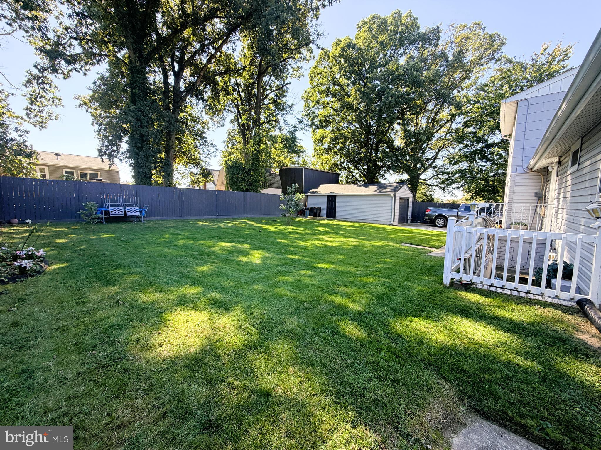 7403 S Road Rosedale, MD 21237 - Photo 25 of 27 a view of a house with backyard and a patio