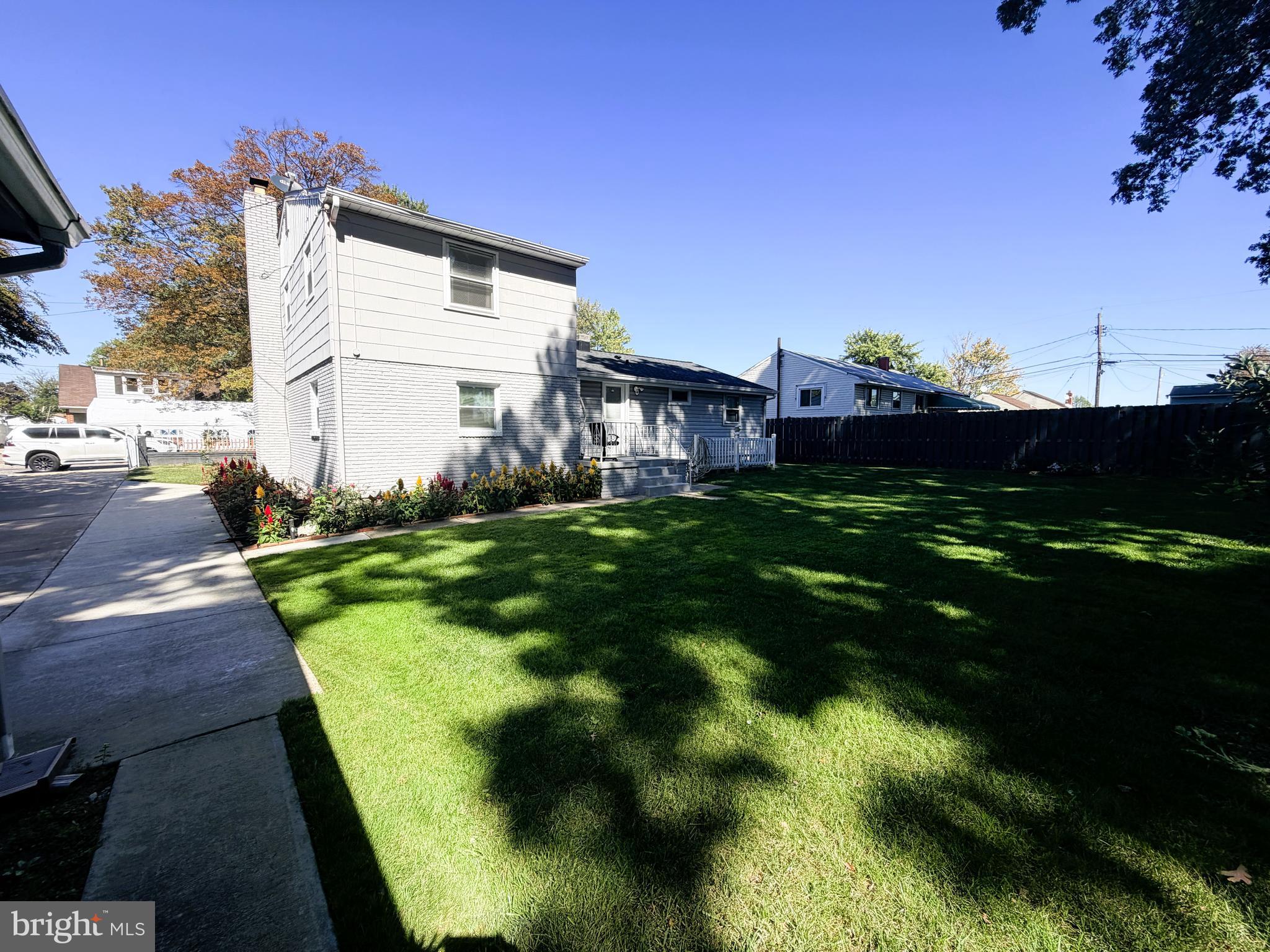 7403 S Road Rosedale, MD 21237 - Photo 27 of 27 a backyard of a house with lots of green space