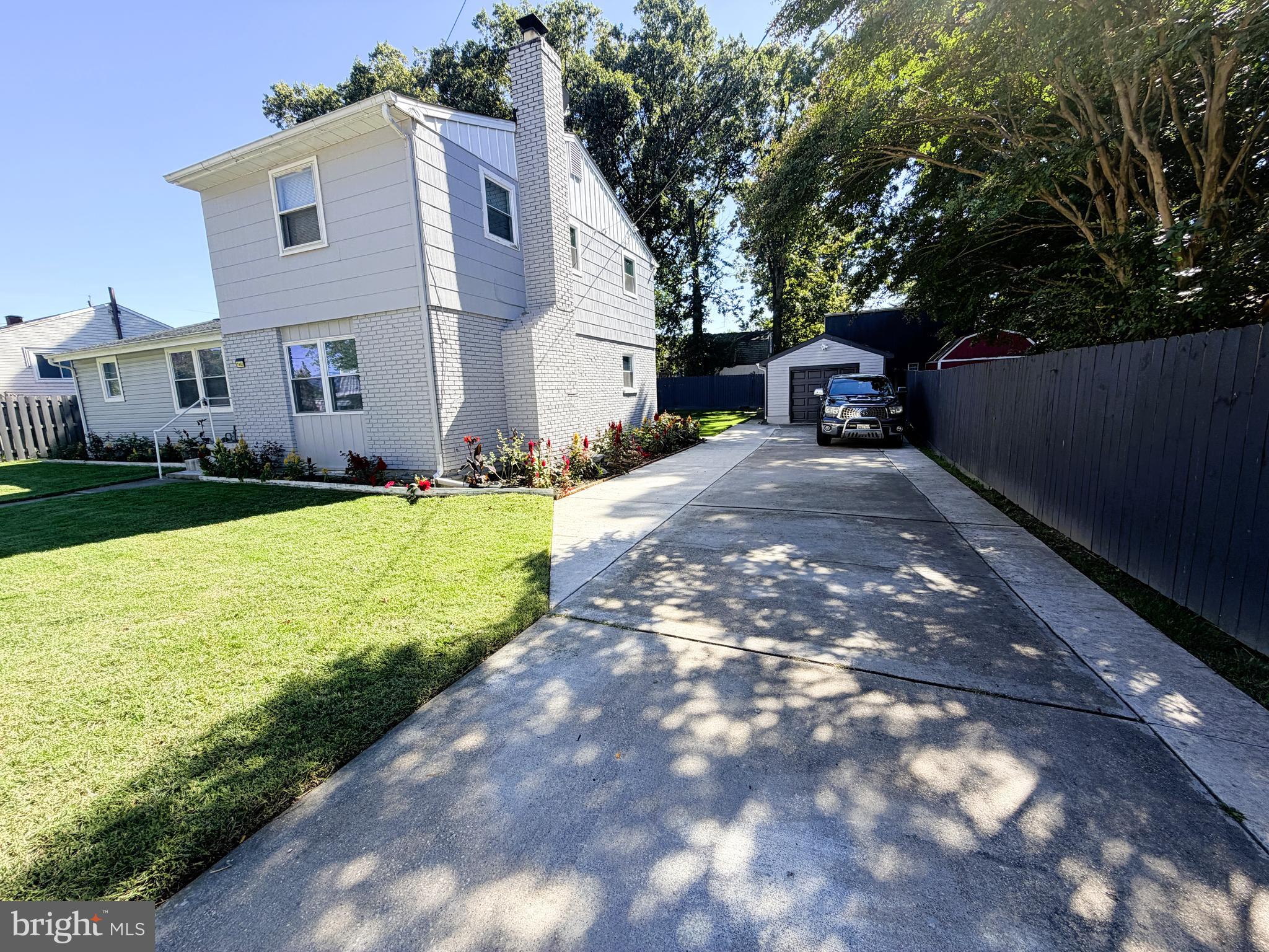 7403 S Road Rosedale, MD 21237 - Photo 5 of 27 a view of a back yard of the house