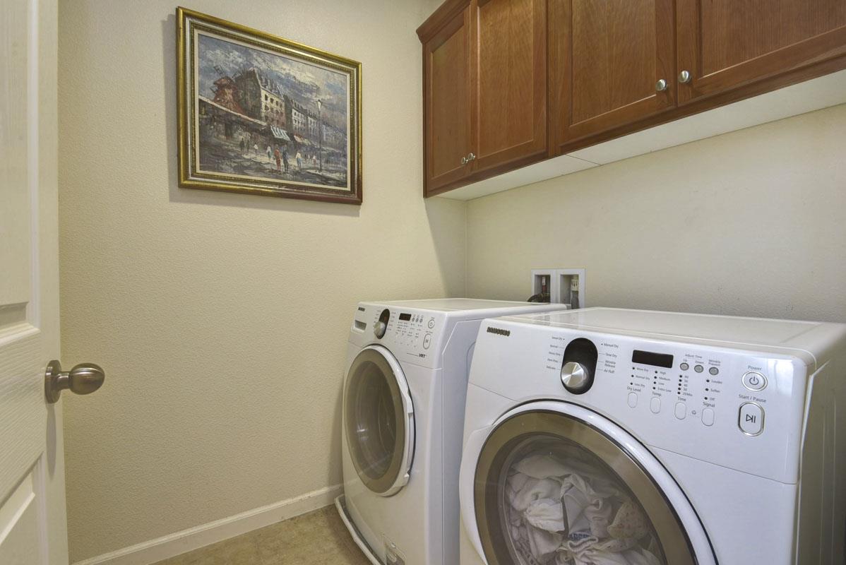 5373 Fioli Loop San Ramon, CA 94582 - Photo 17 of 31 a utility room with dryer and washer