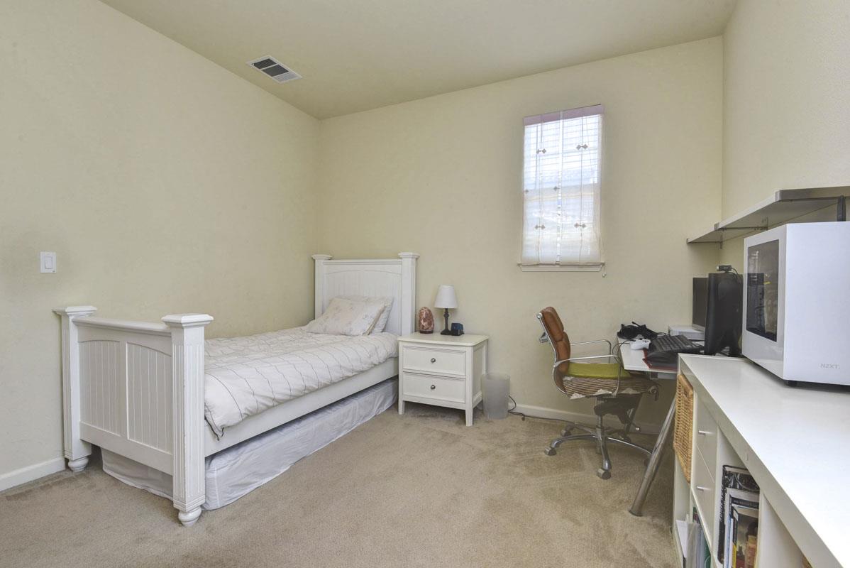 5373 Fioli Loop San Ramon, CA 94582 - Photo 21 of 31 a bedroom with furniture and a flat screen tv