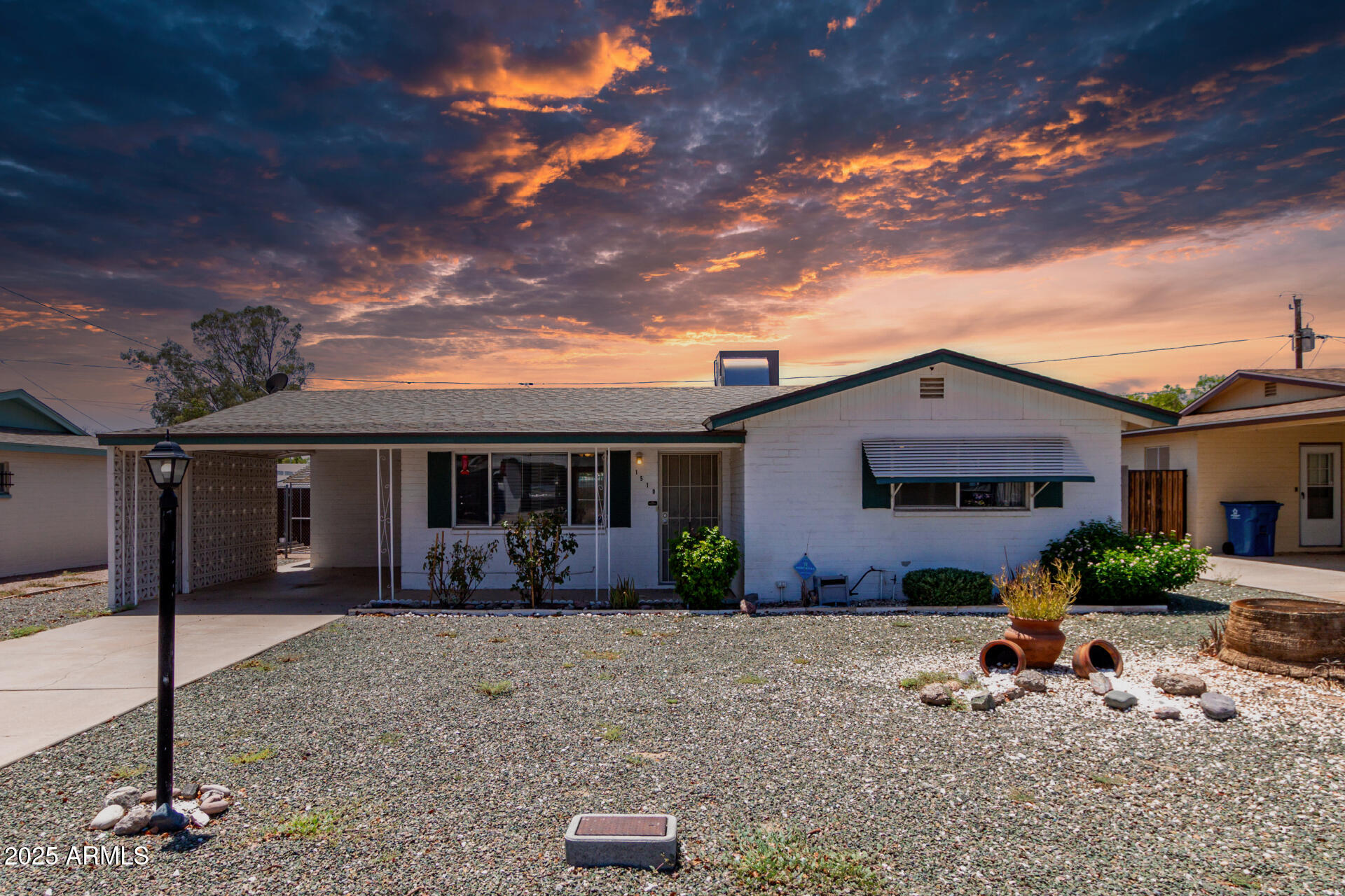 1510 South Lawther Drive Apache Junction, AZ 85120 - Photo 1 of 30 a front view of a house with a porch