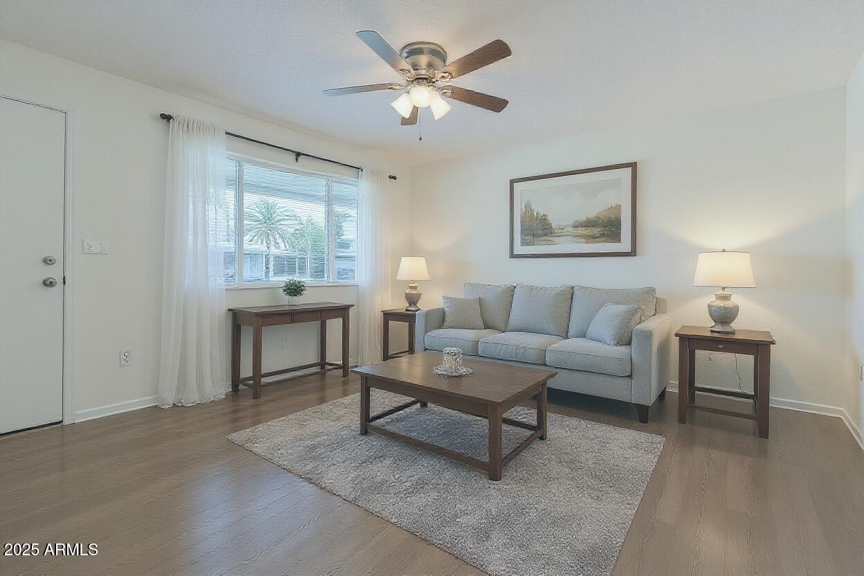 1510 South Lawther Drive Apache Junction, AZ 85120 - Photo 2 of 30 a living room with furniture and a large window