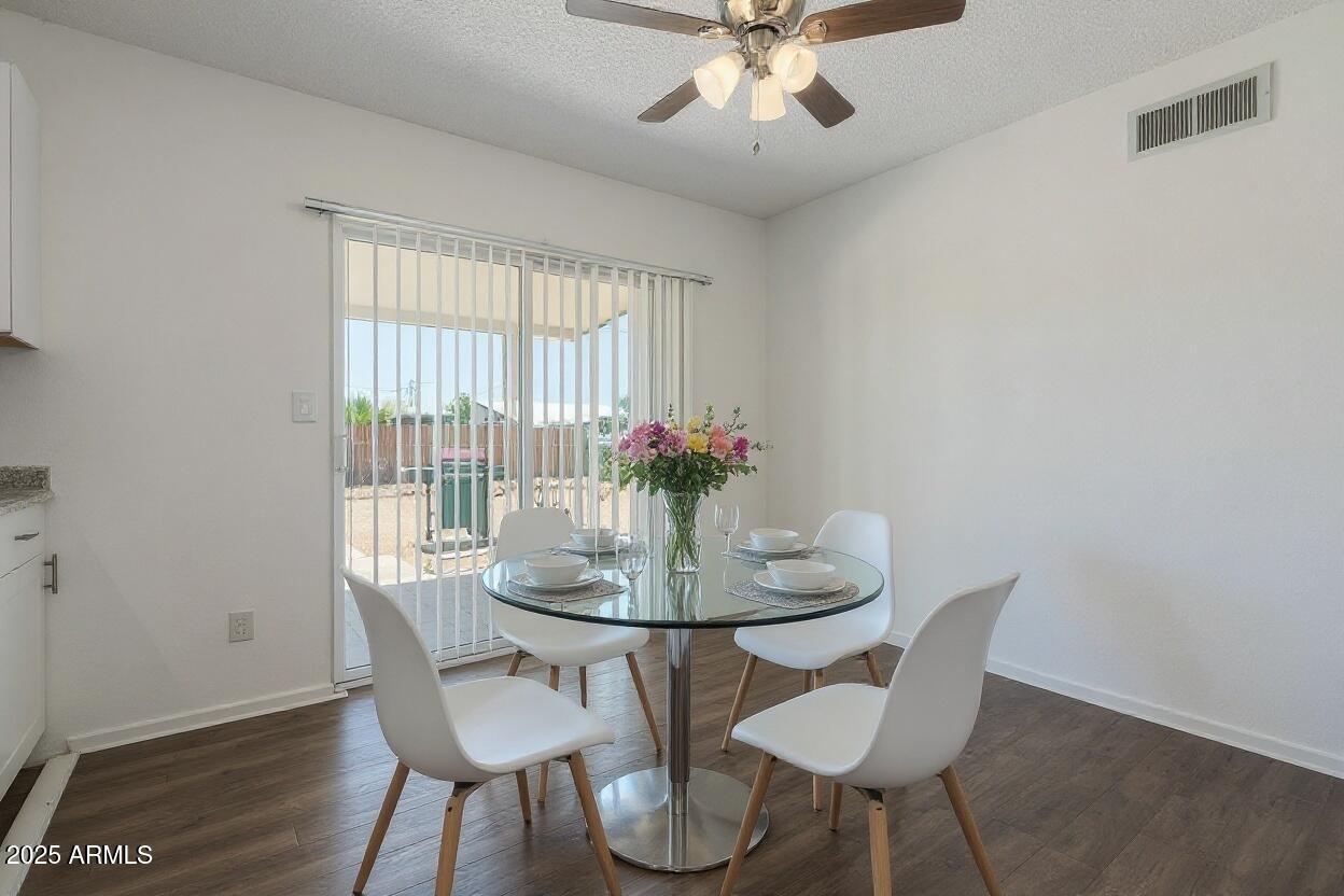 1510 South Lawther Drive Apache Junction, AZ 85120 - Photo 4 of 30 a dining room with furniture and window