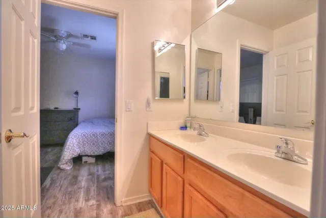 a view of a livingroom with furniture and a window