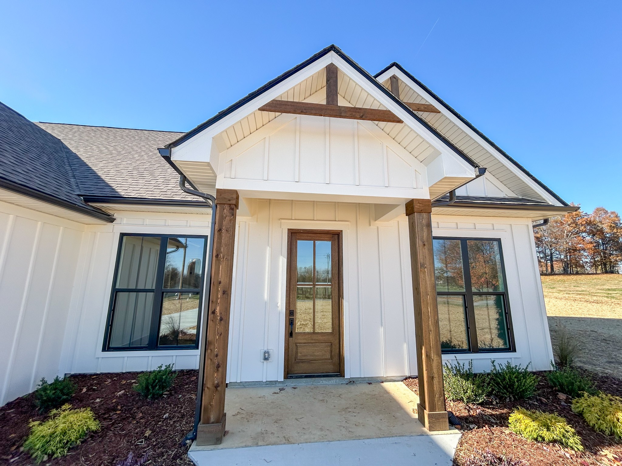 977 Hoodoo Road Beechgrove, TN 37018 - Photo 2 of 22 a front view of a house with a yard