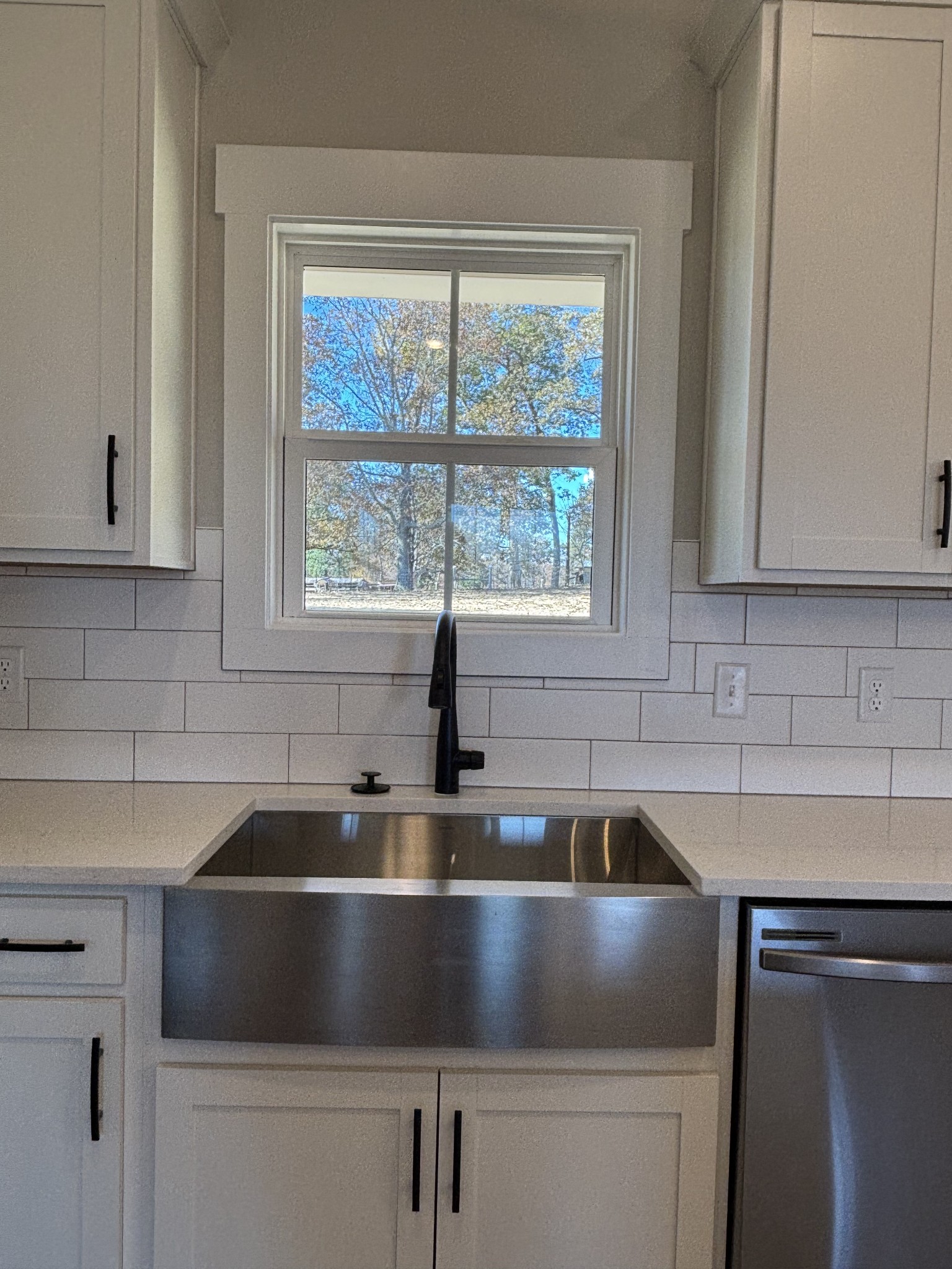 977 Hoodoo Road Beechgrove, TN 37018 - Photo 6 of 22 a kitchen with granite countertop a sink and a window