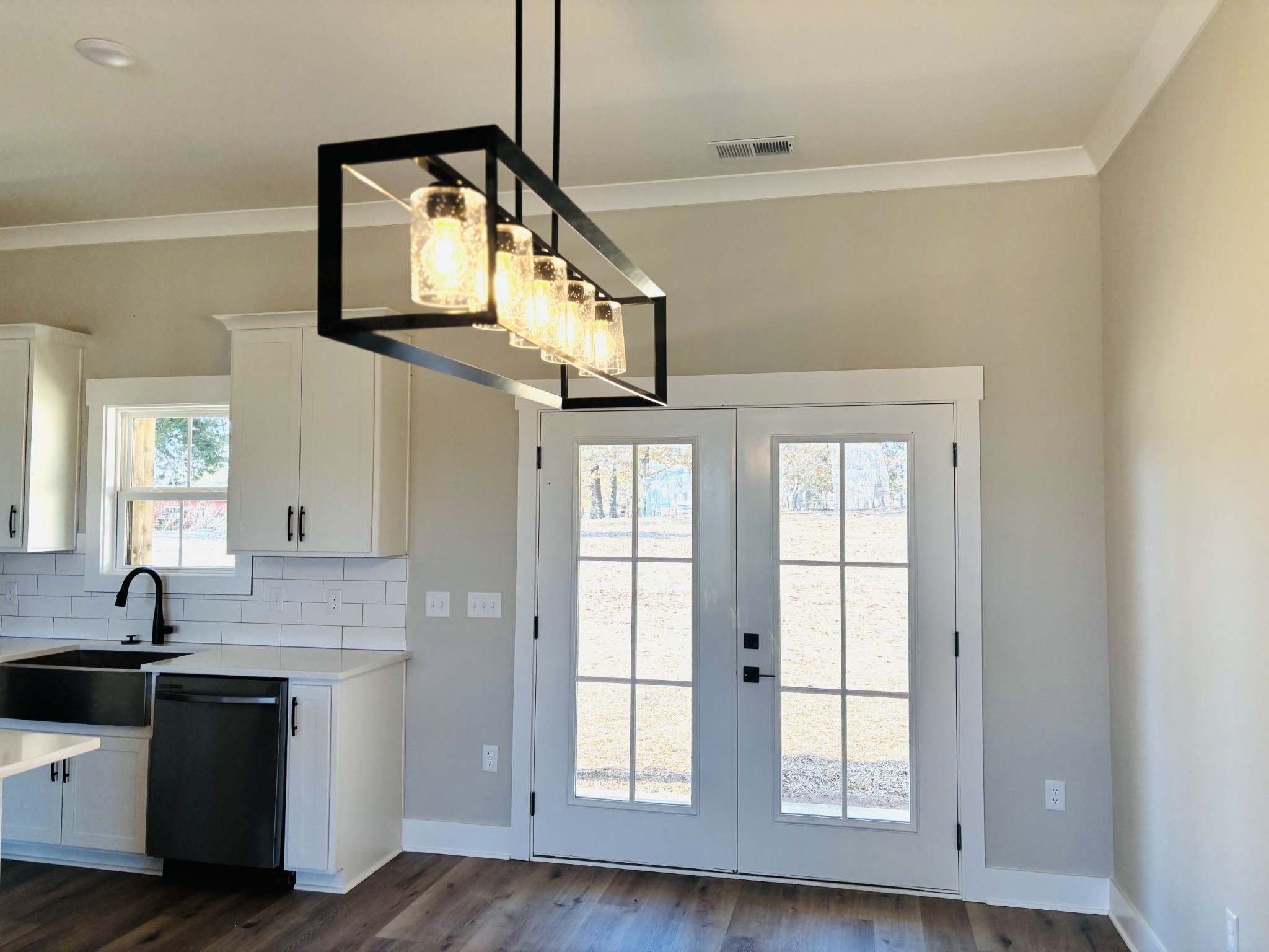 977 Hoodoo Road Beechgrove, TN 37018 - Photo 8 of 22 a kitchen with stainless steel appliances granite countertop a sink and a window