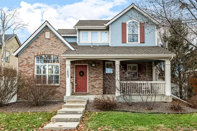 a front view of a house with a porch