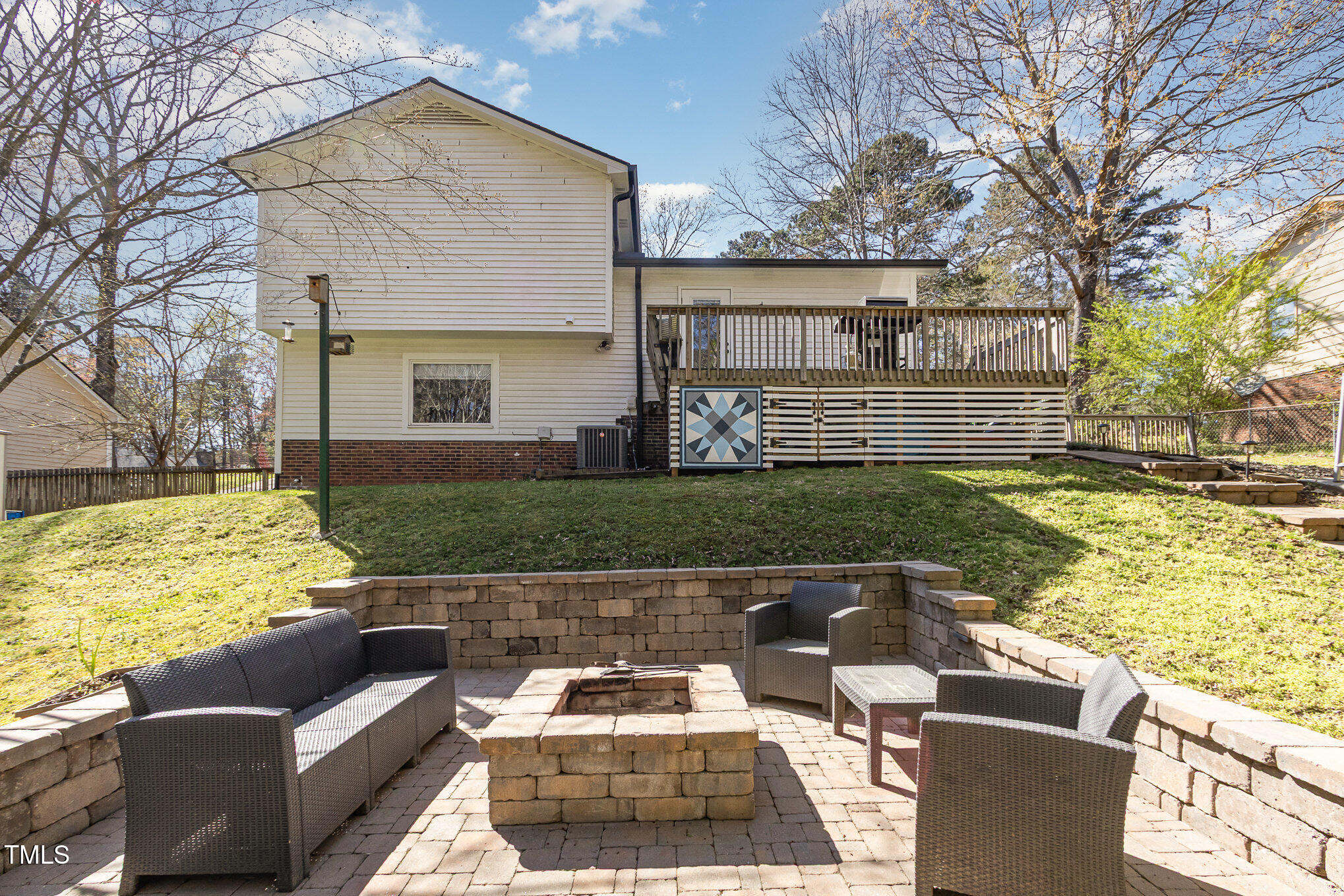 7708 Foxwood Drive Raleigh, NC 27615 - Photo 20 of 25 a view of a patio with couches chairs and a yard