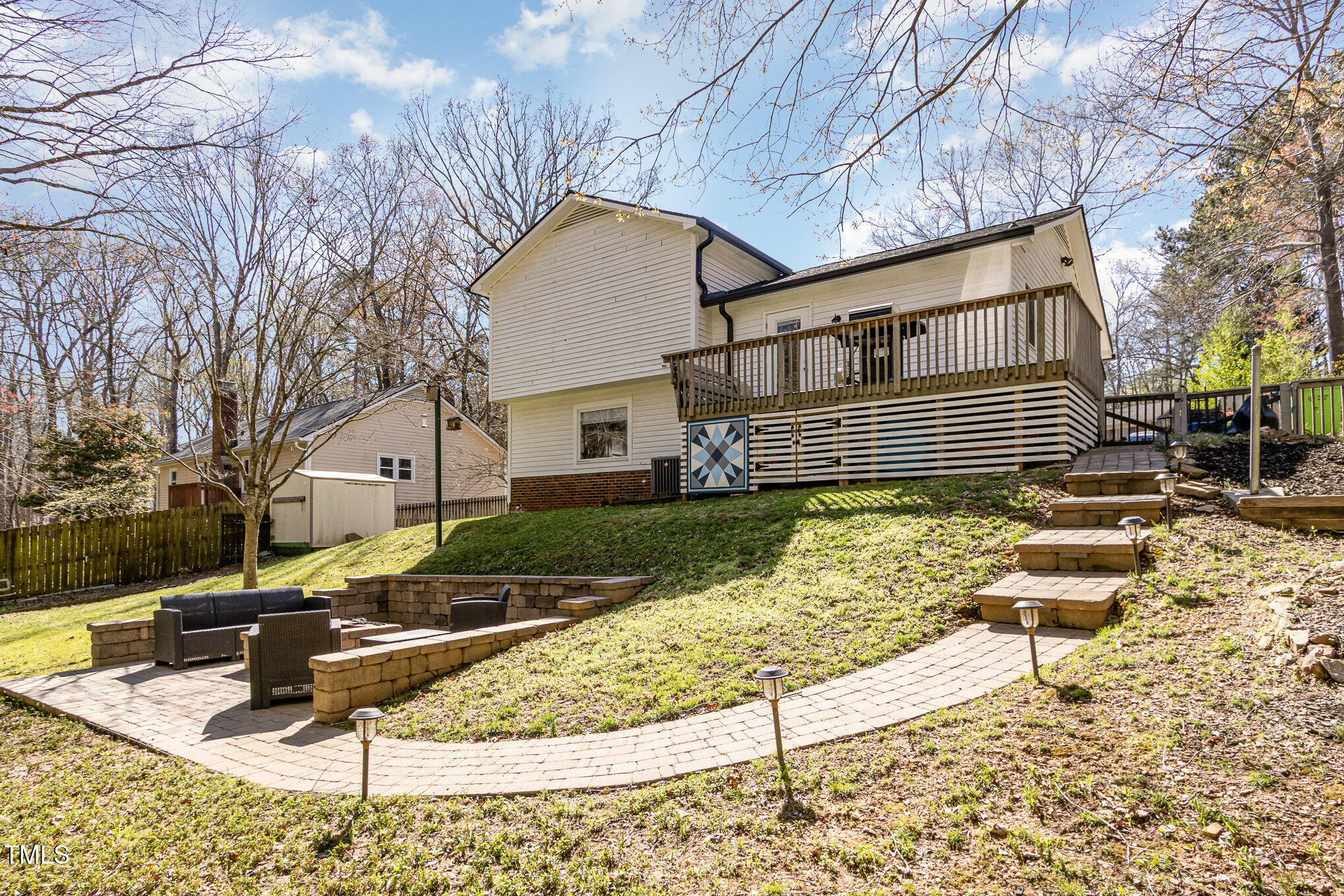 7708 Foxwood Drive Raleigh, NC 27615 - Photo 21 of 25 a front view of a house with garden