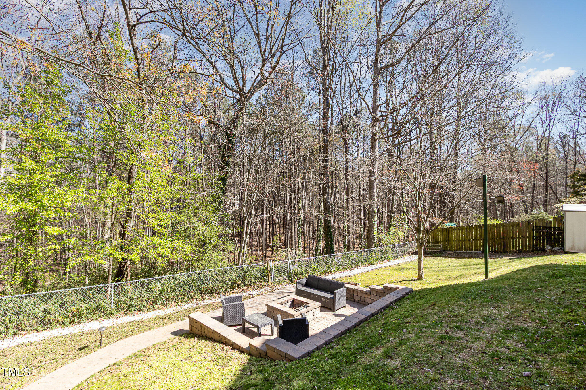 7708 Foxwood Drive Raleigh, NC 27615 - Photo 22 of 25 a view of a backyard with swimming pool