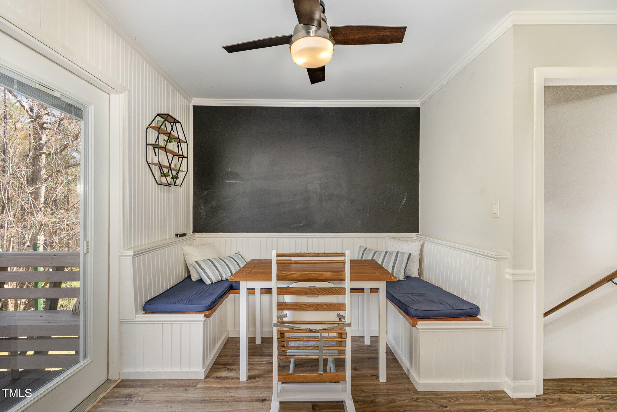 7708 Foxwood Drive Raleigh, NC 27615 - Photo 4 of 25 a bedroom with a bed and a chandelier